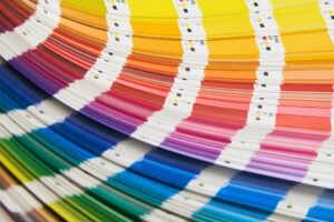 Fanned-out Pantone color swatches representing brand identity and color palette selection